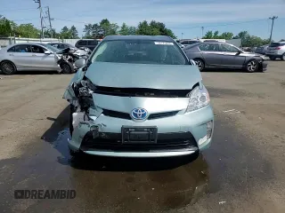 2014 Toyota Prius Four z VIN JTDKN3DU3E1748767, wystawiony jako Copart lot #58175235 z przebiegiem 148 855 mil mil oraz Szkoda całkowita • Salvage title. Historia ofert i sprzedaży dostępna na DreamBid. Obrazek 13.
