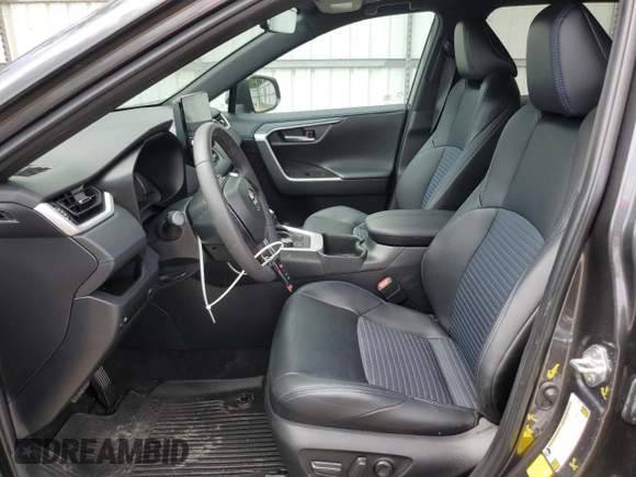 2023 Toyota RAV4 Hybrid XSE with VIN 4T3E6RFV1PU117863, listed as a Copart auction lot 60135555 with 28,248 mi miles and Salvage title. Bid and sale history available at DreamBid. Image 7.
