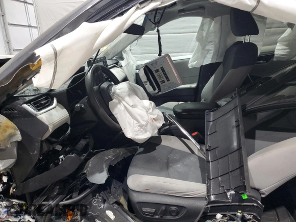 2019 Toyota RAV4 XLE with VIN 2T3P1RFV0KW059311, listed as a Copart auction lot 59777515 with Not provided miles and Salvage title. Bid and sale history available at DreamBid. Image 7.
