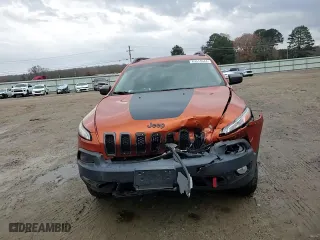 2015 Jeep Cherokee Trailhawk with VIN 1C4PJMBSXFW704942, listed as a Copart auction lot 85514044 with 194,340 mi miles and Salvage Title. Bid and sale history available at carsss.com. Image 12.