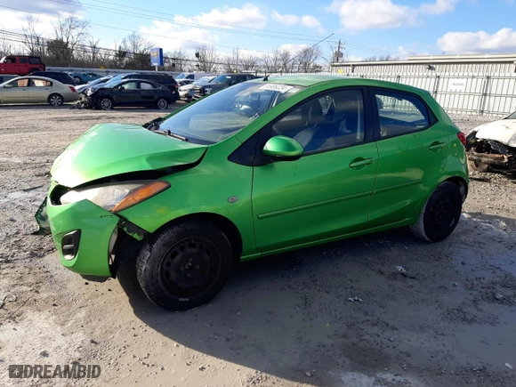 2013 Mazda Mazda2 Sport with VIN JM1DE1KY4D0166491, listed as a Copart auction lot 85989224 with 147,728 mi miles and Salvage Title. Bid and sale history available at carsss.com. Image 1.
