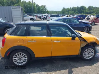 2016 MINI Hardtop 4 Door z VIN WMWXU1C53G2D08424, wystawiony jako IAAI lot #42509304 z przebiegiem 97 729 mil mil oraz . Historia ofert i sprzedaży dostępna na DreamBid. Obrazek 14.