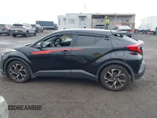 2018 Toyota C-HR XLE with VIN JTNKHMBX6J1000904, listed as a IAAI auction lot 42513117 with 77,192 mi miles and . Bid and sale history available at DreamBid. Image 14.
