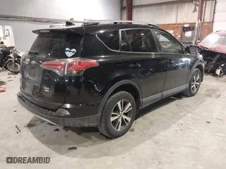 2017 Toyota RAV4 XLE with VIN 2T3RFREV0HW669312, listed as a IAAI auction lot 41410721 with 99,404 mi miles. Bid and sale history available at carsss.com. Image 4.