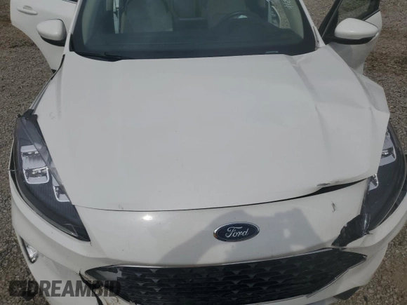 2020 Ford Escape Titanium z VIN 1FMCU9J9XLUB57675, wystawiony jako Copart lot #57777795 z przebiegiem Nie podano mil oraz Szkoda całkowita • Salvage title. Historia ofert i sprzedaży dostępna na DreamBid. Obrazek 12.