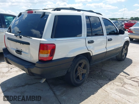 2004 Jeep Grand Cherokee Laredo z VIN 1J4GX48S74C152542, wystawiony jako IAAI lot #42350507 z przebiegiem 176 366 mil mil oraz . Historia ofert i sprzedaży dostępna na DreamBid. Obrazek 4.