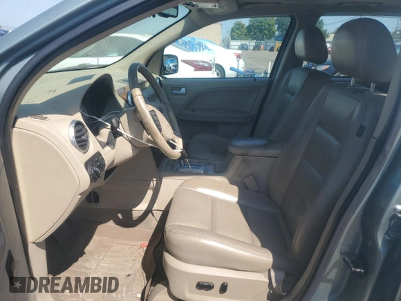 2007 Ford Freestyle Limited z VIN 1FMDK06117GA06091, wystawiony jako Copart lot #71226554 z przebiegiem 117 663 mil mil oraz Szkoda całkowita • Salvage title. Historia ofert i sprzedaży dostępna na DreamBid. Obrazek 7.