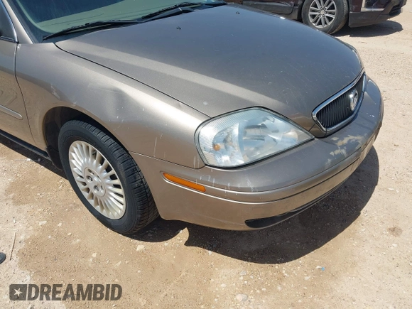 2003 Mercury Sable GS z VIN 1MEFM50U23A601955, wystawiony jako IAAI lot #42197171 z przebiegiem 94 977 mil mil oraz . Historia ofert i sprzedaży dostępna na DreamBid. Obrazek 6.