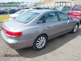 2006 Hyundai Azera SE with VIN KMHFC46F06A107049, listed as a IAAI auction lot 42638717 with 158,094 mi miles and . Bid and sale history available at DreamBid. Image 4.