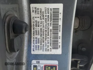 2012 Honda Insight EX z VIN JHMZE2H76CS001683, wystawiony jako Copart lot #49061885 z przebiegiem 259 158 mil mil oraz Szkoda całkowita • Salvage title. Historia ofert i sprzedaży dostępna na DreamBid. Obrazek 12.