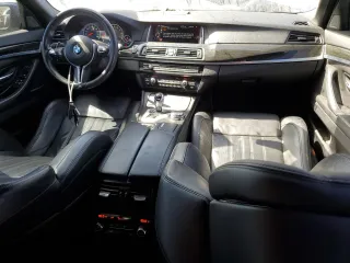 2016 BMW M5 with VIN WBSFV9C57GG343387, listed as a Copart auction lot 73416564 with 71,131 mi miles and Salvage Title. Bid and sale history available at carsss.com. Image 8.