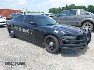 2021 Dodge Charger Police with VIN 2C3CDXAT7MH523170, listed as a IAAI auction lot 42322244 with 90,825 mi miles and . Bid and sale history available at DreamBid. Image 1.