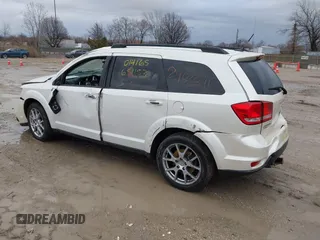 2013 Dodge Journey R/T with VIN 3C4PDDEG0DT651153, listed as a IAAI auction lot 41724885 with 133,391 mi miles and . Bid and sale history available at DreamBid. Image 3.