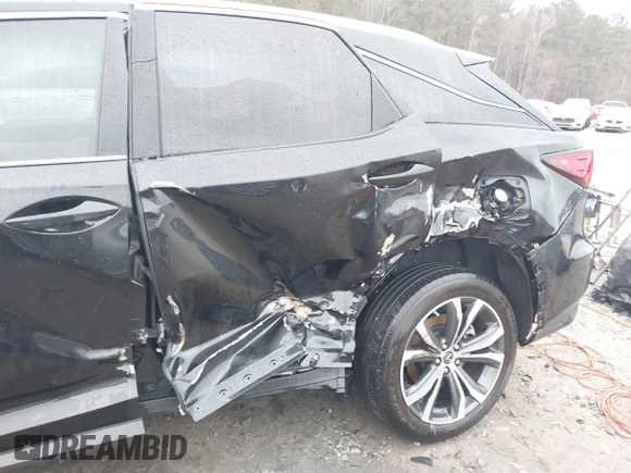 2021 Lexus RX with VIN 2T2HZMAA0MC201749, listed as a IAAI auction lot 41426758 with 148,064 mi miles. Bid and sale history available at carsss.com. Image 6.