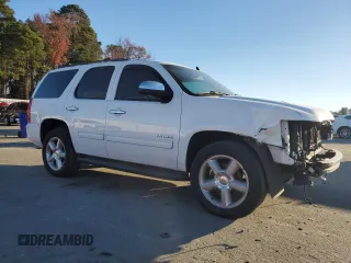 2013 Chevrolet Tahoe LS with VIN 1GNSCAE09DR340125, listed as a Copart auction lot 82894734 with 214,909 mi miles and Salvage title. Bid and sale history available at DreamBid. Image 4.