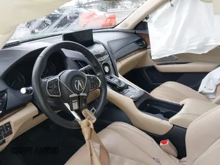 2019 Acura RDX w/Advance Pkg with VIN 5J8TC2H75KL017199, listed as a IAAI auction lot 41565130 with 67,880 mi miles. Bid and sale history available at carsss.com. Image 5.