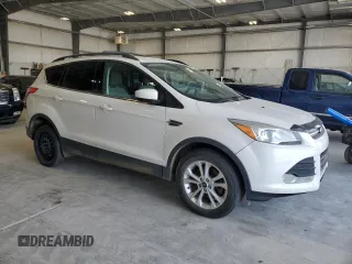 2015 Ford Escape SE with VIN 1FMCU9GX3FUB83917, listed as a Copart auction lot 52743405 with 130,783 mi miles and Clean Title. Bid and sale history available at carsss.com. Image 4.