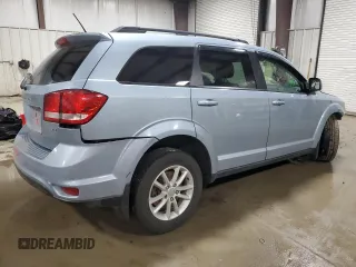 2013 Dodge Journey SXT with VIN 3C4PDDBG8DT579154, listed as a Copart auction lot 51261135 with 96,230 mi miles and Salvage Title. Bid and sale history available at DreamBid. Image 3.