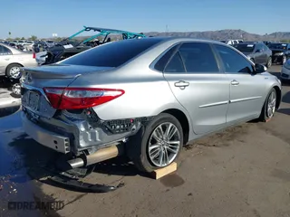 2015 Toyota Camry Hybrid LE with VIN 4T1BD1FK5FU161257, listed as a IAAI auction lot 41759927 with 116,853 mi miles. Bid and sale history available at carsss.com. Image 4.