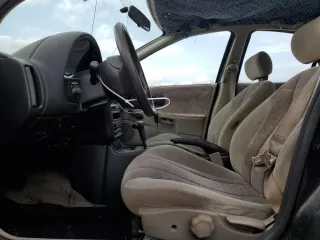 1996 Saturn SL with VIN 1G8ZK5278TZ255742, listed as a Copart auction lot 79050024 with 83,205 mi miles and Salvage title. Bid and sale history available at DreamBid. Image 7.