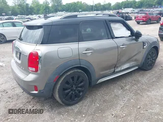 2018 MINI Countryman Cooper z VIN WMZYV5C39J3E02982, wystawiony jako IAAI lot #42384795 z przebiegiem 74 599 mil mil oraz . Historia ofert i sprzedaży dostępna na DreamBid. Obrazek 4.