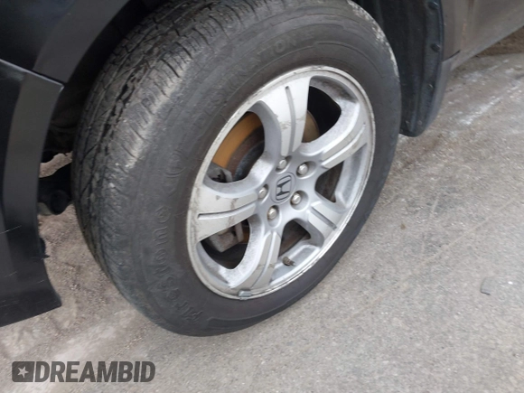 2012 Honda Pilot EX-L with VIN 5FNYF4H52CB068007, listed as a IAAI auction lot 42184390 with 137,126 mi miles and . Bid and sale history available at DreamBid. Image 12.