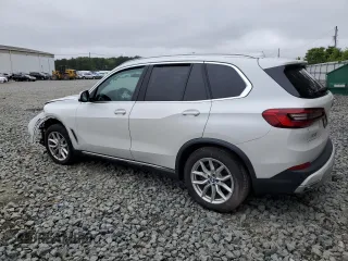 2020 BMW X5 xDrive40i with VIN 5UXCR6C06L9B11252, listed as a Copart auction lot 59634655 with Not provided miles and Salvage title. Bid and sale history available at DreamBid. Image 2.