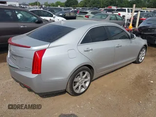 2014 Cadillac ATS Luxury RWD with VIN 1G6AB5RX7E0143954, listed as a IAAI auction lot 42156629 with 79,619 mi miles and . Bid and sale history available at DreamBid. Image 4.