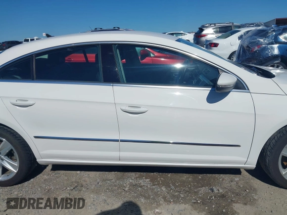 2013 Volkswagen CC Sport z VIN WVWAP7AN7DE545141, wystawiony jako IAAI lot #42325238 z przebiegiem 170 478 mil mil oraz . Historia ofert i sprzedaży dostępna na DreamBid. Obrazek 14.