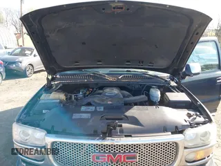2005 GMC Yukon Denali z VIN 1GKEK63U55J254214, wystawiony jako IAAI lot #42103378 z przebiegiem 131 183 mil mil oraz . Historia ofert i sprzedaży dostępna na DreamBid. Obrazek 10.