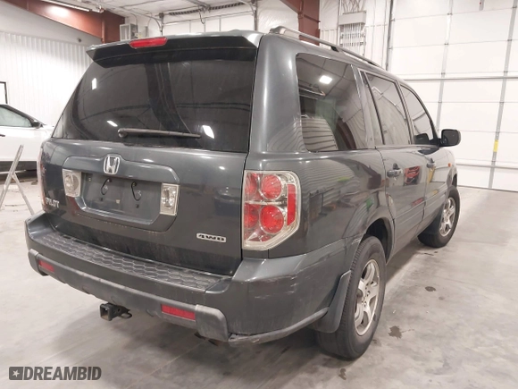 2006 Honda Pilot EX with VIN 2HKYF18466H504644, listed as a IAAI auction lot 41949350 with 256,464 mi miles. Bid and sale history available at carsss.com. Image 4.