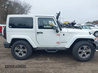 2011 Jeep Wrangler Sahara with VIN 1J4AA5D15BL538240, listed as a IAAI auction lot 41793836 with 172,528 mi miles and . Bid and sale history available at carsss.com. Image 13.