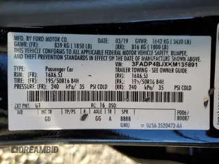 2019 Ford Fiesta SE z VIN 3FADP4BJXKM135891, wystawiony jako Copart lot #47369075 z przebiegiem 127 721 mil mil oraz Szkoda całkowita • Salvage title. Historia ofert i sprzedaży dostępna na DreamBid. Obrazek 14.