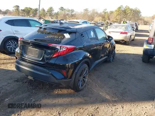 2021 Toyota C-HR LE with VIN JTNKHMBX1M1118203, listed as a IAAI auction lot 40936962 with 18,424 mi miles. Bid and sale history available at carsss.com. Image 4.