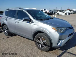 2016 Toyota RAV4 XLE with VIN 2T3WFREV1GW310309, listed as a IAAI auction lot 41993270 with 200,289 mi miles. Bid and sale history available at carsss.com. Image 1.