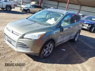 2014 Ford Escape Titanium with VIN 1FMCU9J96EUA15990, listed as a IAAI auction lot 41667046 with 203,202 mi miles. Bid and sale history available at carsss.com. Image 17.