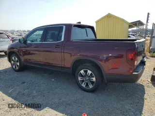 2019 Honda Ridgeline RTL with VIN 5FPYK3F52KB039850, listed as a Copart auction lot 64013955 with 75,366 mi miles and Salvage title. Bid and sale history available at DreamBid. Image 2.