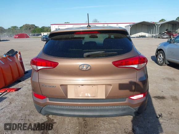 2017 Hyundai Tucson SE with VIN KM8J23A40HU525982, listed as a IAAI auction lot 41790898 with 107,715 mi miles. Bid and sale history available at carsss.com. Image 16.