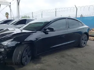 2023 Tesla Model 3 with VIN 5YJ3E1EA7PF473749, listed as a IAAI auction lot 41921478 with 21,483 mi miles and . Bid and sale history available at DreamBid. Image 13.