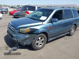 2006 Honda Pilot EX-L with VIN 2HKYF18536H548948, listed as a IAAI auction lot 36572651 with 242,758 mi miles and . Bid and sale history available at DreamBid. Image 2.