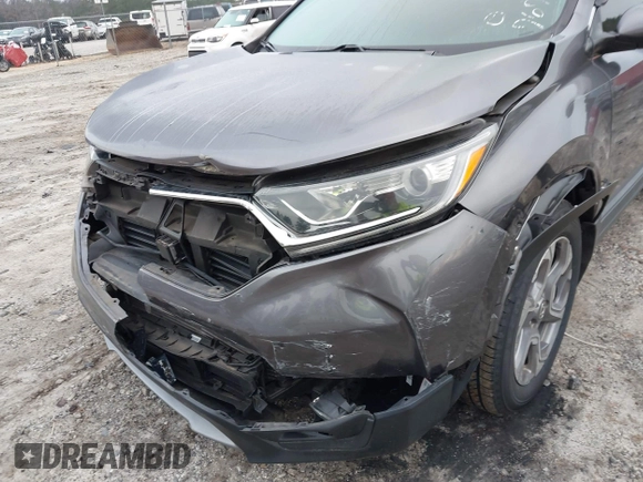 2019 Honda CR-V EX with VIN 7FARW1H57KE037678, listed as a IAAI auction lot 41790923 with 61,754 mi miles and . Bid and sale history available at DreamBid. Image 6.