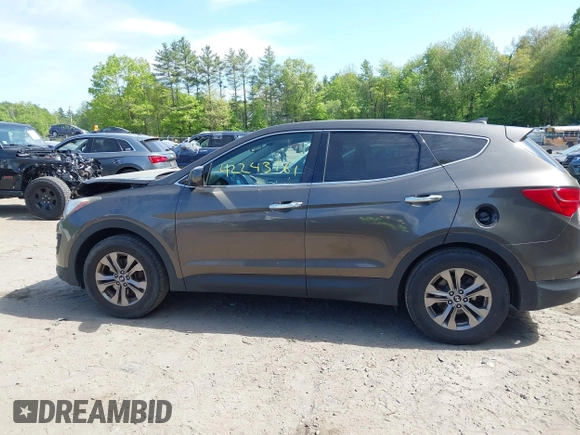 2014 Hyundai Santa Fe with VIN 5XYZTDLB2EG143925, listed as a IAAI auction lot 42243761 with 126,058 mi miles and . Bid and sale history available at DreamBid. Image 14.
