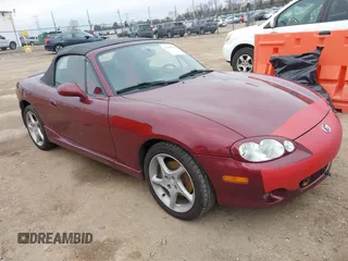 2003 Mazda MX-5 Miata Cloth with VIN JM1NB353X30308589, listed as a IAAI auction lot 41454795 with 110,940 mi miles and . Bid and sale history available at DreamBid. Image 1.