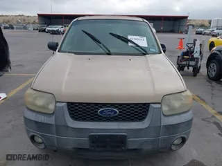 2007 Ford Escape XLT with VIN 1FMYU03157KB25095, listed as a IAAI auction lot 41501314 with 131,738 mi miles. Bid and sale history available at carsss.com. Image 6.