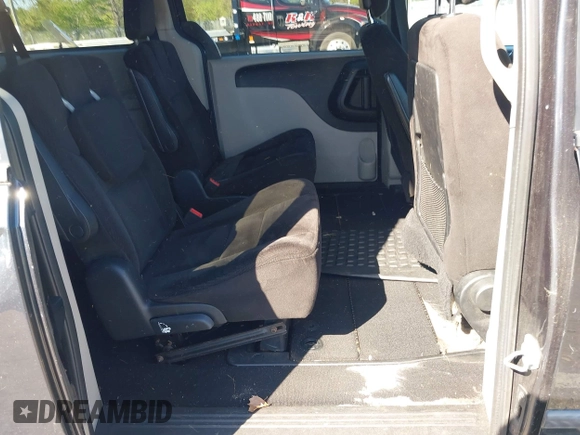 2014 Dodge Grand Caravan SE with VIN 2C4RDGBGXER254634, listed as a IAAI auction lot 42149494 with 158,614 mi miles and . Bid and sale history available at DreamBid. Image 8.
