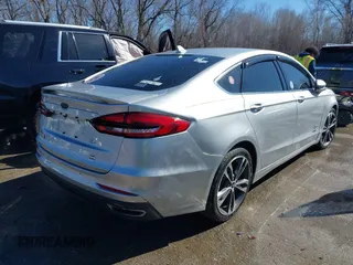 2019 Ford Fusion Titanium with VIN 3FA6P0D91KR187109, listed as a IAAI auction lot 41646320 with 107,125 mi miles. Bid and sale history available at carsss.com. Image 4.