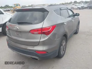 2016 Hyundai Santa Fe z VIN 5XYZU3LB3GG370826, wystawiony jako IAAI lot #42325158 z przebiegiem 146 916 mil mil oraz . Historia ofert i sprzedaży dostępna na DreamBid. Obrazek 4.