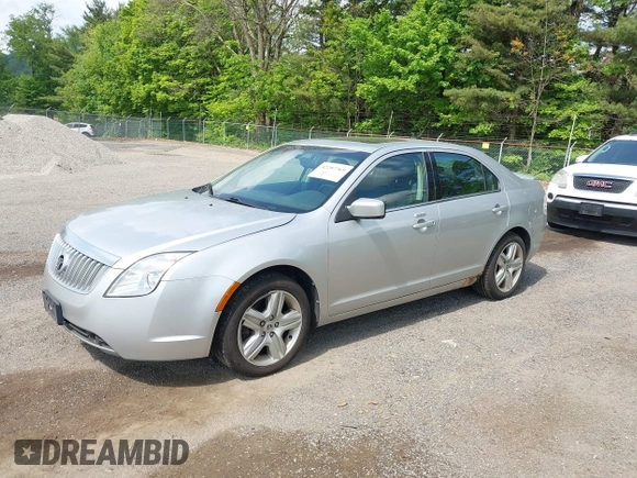 2011 Mercury Milan z VIN 3MEHM0HA5BR602401, wystawiony jako IAAI lot #42287369 z przebiegiem 100 139 mil mil oraz . Historia ofert i sprzedaży dostępna na DreamBid. Obrazek 2.