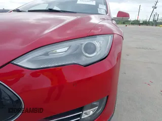 2014 Tesla Model S 60 with VIN 5YJSA1H17EFP30148, listed as a IAAI auction lot 39188024 with Not Provided miles and . Bid and sale history available at DreamBid. Image 6.