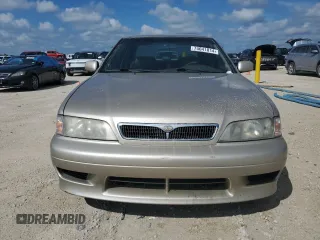 2002 Infiniti G20 Luxury z VIN JNKCP11A12T501940, wystawiony jako Copart lot #74041014 z przebiegiem Nie podano mil oraz Szkody całkowita. Historia ofert i sprzedaży dostępna na DreamBid. Obrazek 5.
